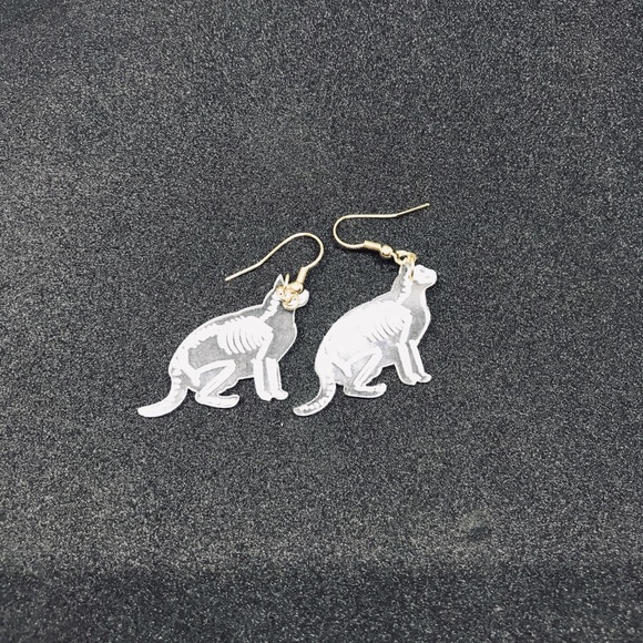 Acrylic cat skeleton x ray earrings. - Picture 4 of 7